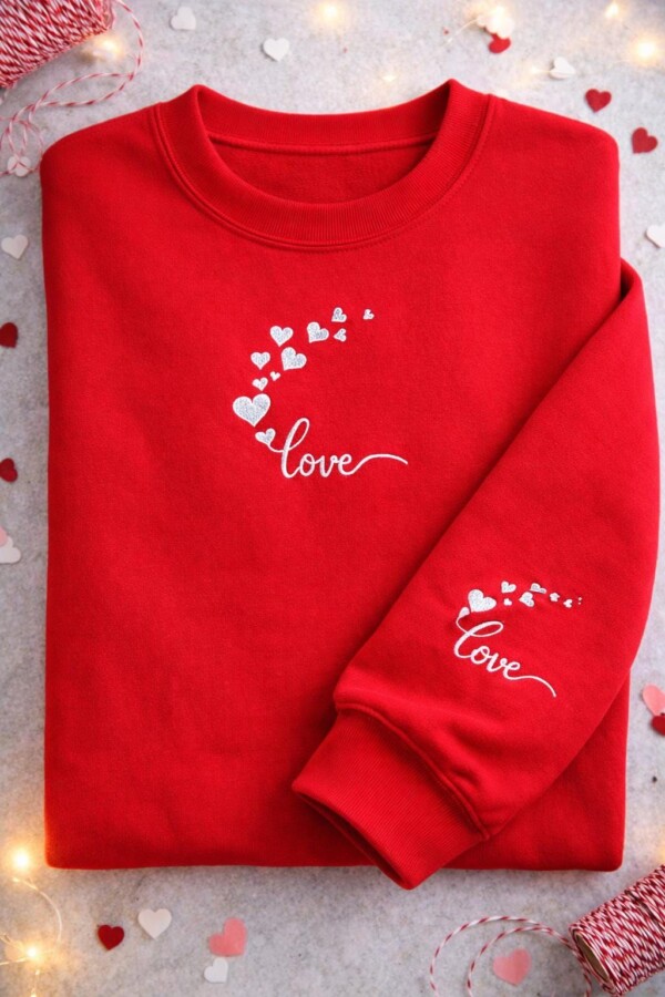 Pull brodé Amour femme